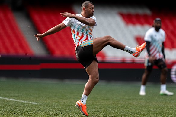 Kurtley Beale kicks the ball at training on Monday.