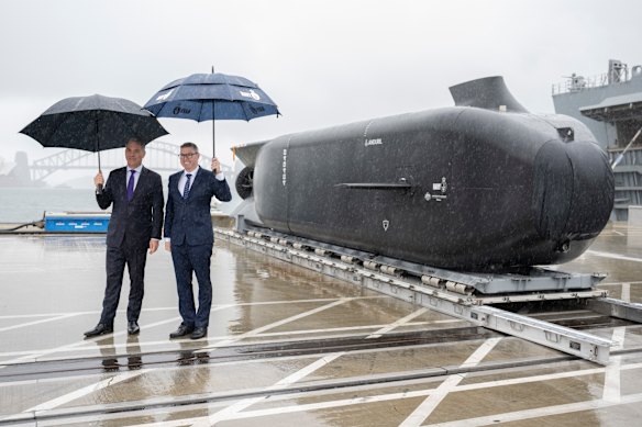 Deputy Prime Minister Richard Marles and Minister for Defence Industry Pat Conroy unveil the Ghost Shark.
