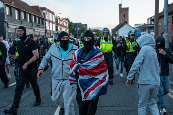 In Epping, the riots put a public, sometimes balaclava-clad, face on the strain of boat arrivals.