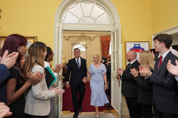 The couple walk into 10 Downing Street.
