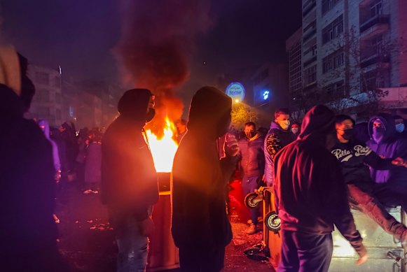 Iranians attend an anti-government protest in Tehran last Thursday, the day. Iran was plunged into a nationwide internet blackout, amid widespread protests over dire economic conditions and anger at the regime.