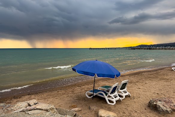 A classically sandy beach on the shores of the 1600-metre high Issyk Kul Lake in Kyrgyzstan empties as a storm approaches.