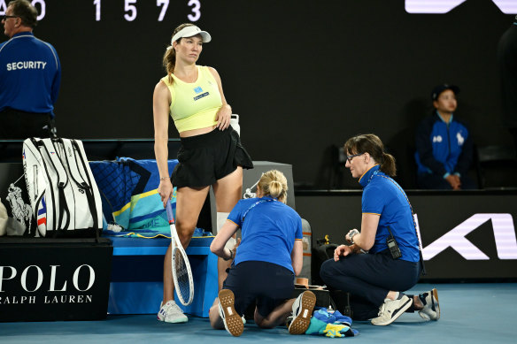 Danielle Collins receives medical treatment during the match.