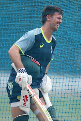 Marsh reacts after he was hit in the groin during training on Sunday.