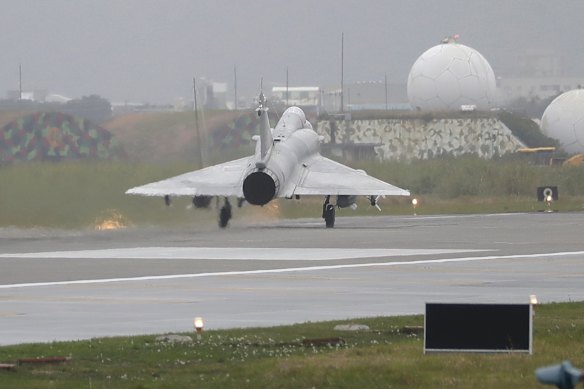A Taiwanese Mirage 2000 fighter jet lands at an airbase in Hsinchu, northern Taiwan. The island’s defence force regularly scrambles jets in response to Chinese fighter planes encroaching on its defence zones. 