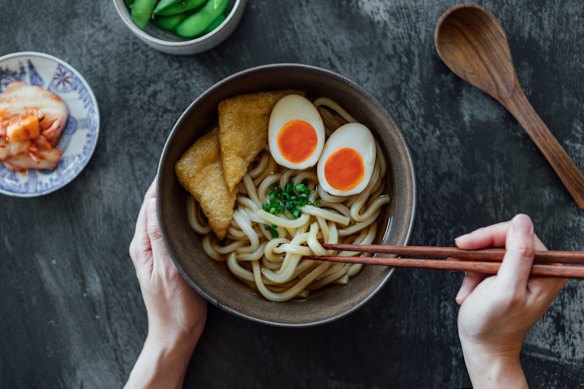 Traditional Japanese udon noodles with soft boiled eggs.