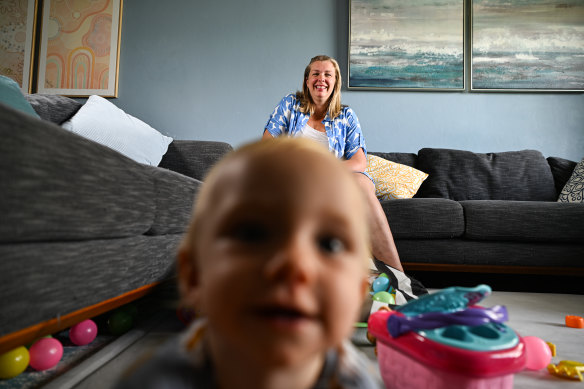 Sarah O’Donnell, with 8-month-old Sophie, welcomes the “breathing room” afforded by the rate cut.