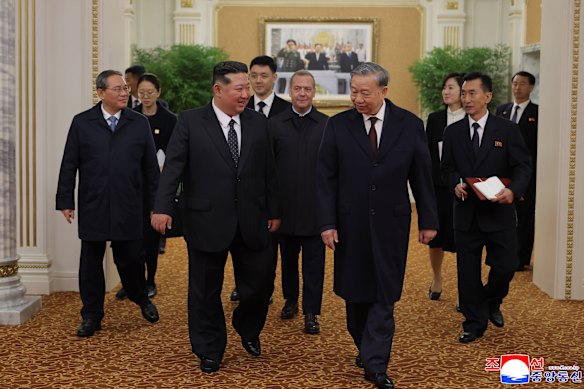 North Korean leader Kim Jong-un (centre left) greets Chinese Premier Li Qiang (centre right), Vietnamese Communist Party General Secretary To Lam (left) and Russian Security Council Deputy Chairman Dmitry Medvedev (centre) in Pyongyang.