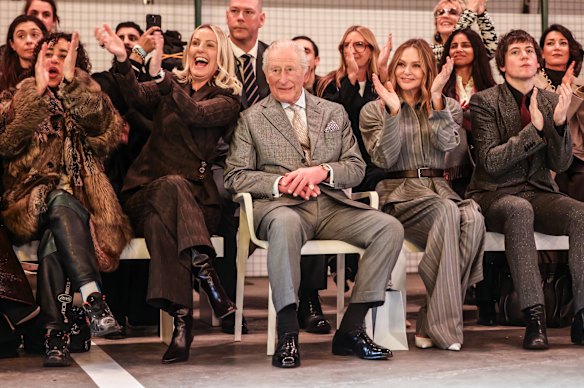 King Charles attends a London Fashion Week event with British Fashion Council chief executive Laura Weir (left) and Stella McCartney (right) just hours after his brother’s arrest.