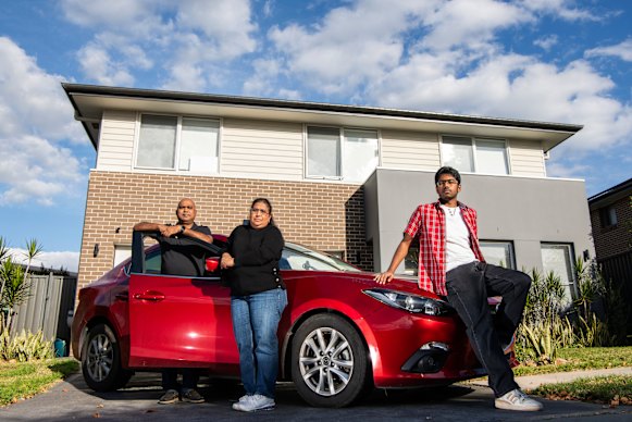Raj Raman, wife Rathiga and son Rajmallan, 19, at home in Riverstone. 