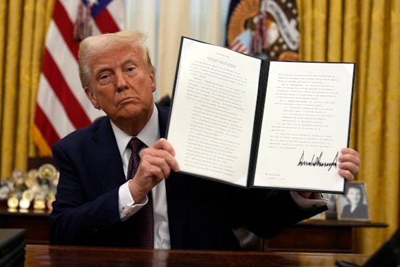 President Donald Trump signs an executive order relating to cryptocurrency in January.