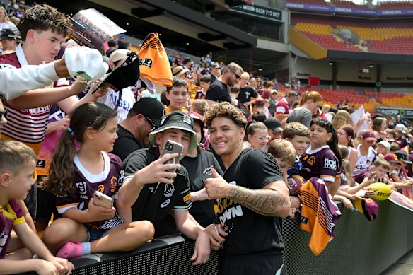 Broncos fans flock to Reece Walsh during this week’s open training session at Suncorp Stadium.