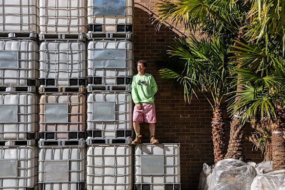Hewson outside his Alexandria studio, a hoarder’s delight.
