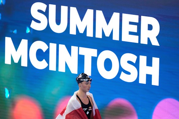 Summer McIntosh of Canada celebrates after winning gold. 