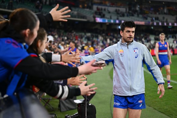 Bulldog Matt Kennedy acknowledges the fans after the game at the MCG. He’s set to miss next week due to the concussion protocols.