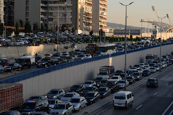 Cars sit in traffic as people seek to escape Dahiyeh on Thursday.