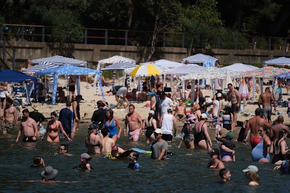 A packed Sydney beach on Saturday, when Victoria battled bushfires and Queensland endured floods.