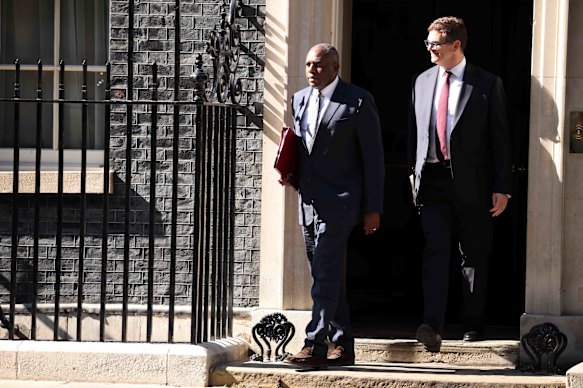British Foreign Secretary David Lammy (left) leaves Downing Street after an emergency Cobra meeting on Wednesday.