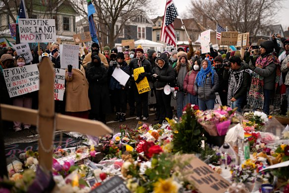 Protesters in Minneapolis on Sunday AEDT gather at a makeshift memorial at the shooting site where Renee Good was fatally shot by an ICE officer last week.