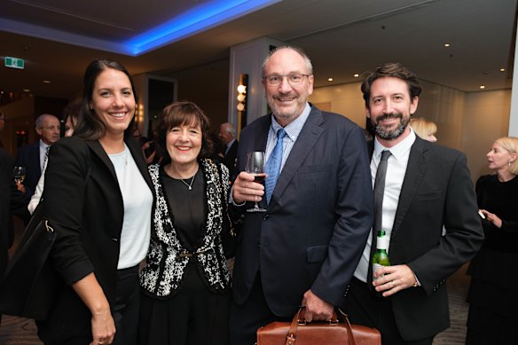 Treasury chair John Mullen (second from the right) with his family, Jen, Jacqui, and Tim.