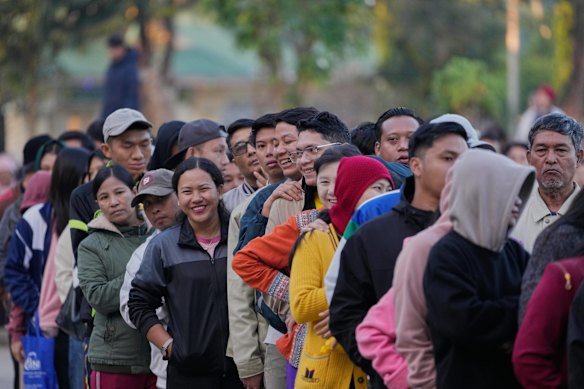 Voters line up to cast their ballots at a polling station in Naypyidaw, Myanmar.