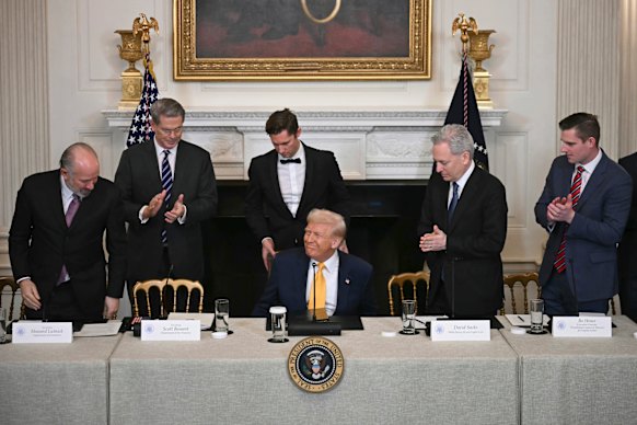 Trump at the White House crypto summit in March with (from left) Commerce Secretary Howard Lutnick, Treasury Secretary Scott Bessent, a staff member, Sacks and Bo Hines, a member of the presidential council of advisers for digital assets.