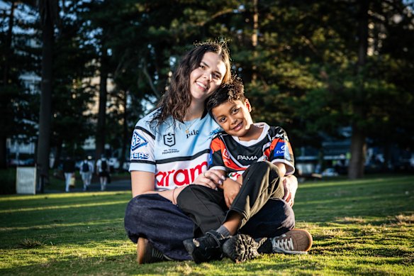 Five-year old Wests Tigers fan Noah Deguara with big sister Liv, 20, on Tuesday.