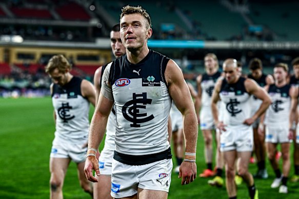 Carlton skipper Patrick Cripps leads his team off the Adelaide Oval on Thursday after another disappointing performance in a prime-time slot on the AFL schedule.