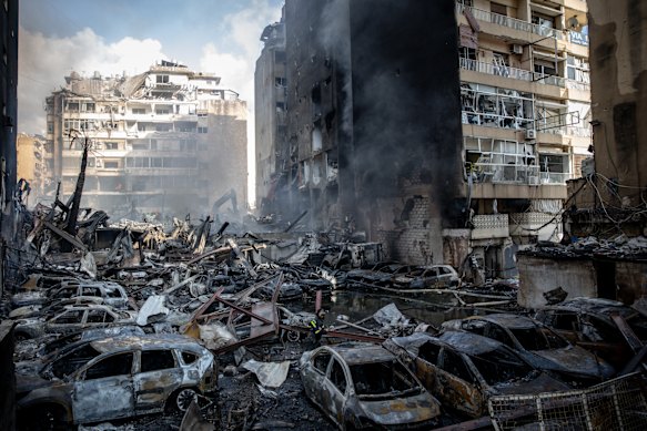 The aftermath of an Israeli airstrike in Beirut, Lebanon, in what the IDF said was its largest onslaught of strikes since the war began.