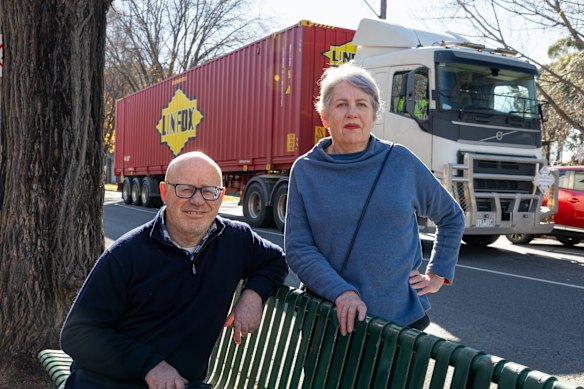 Epson St resident Tony Ceddia and Kate Kennedy, chair of the Kensington Association. For every tree removed for the West Gate Tunnel, five were to be replanted, however a City of Melbourne report shows there will be a 3,000 tree shortfall and truck traffic through Kensington has increased.
