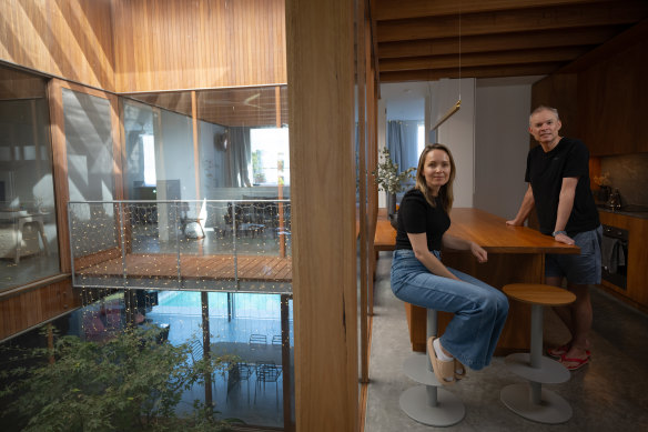 Owners Elizabeth and Stephen Procter astatine  their home, called Shed House, successful  Earlwood. Designed by designer  Toby Breakspear, it has been shortlisted for the 2024 NSW Architecture Awards for caller   houses.