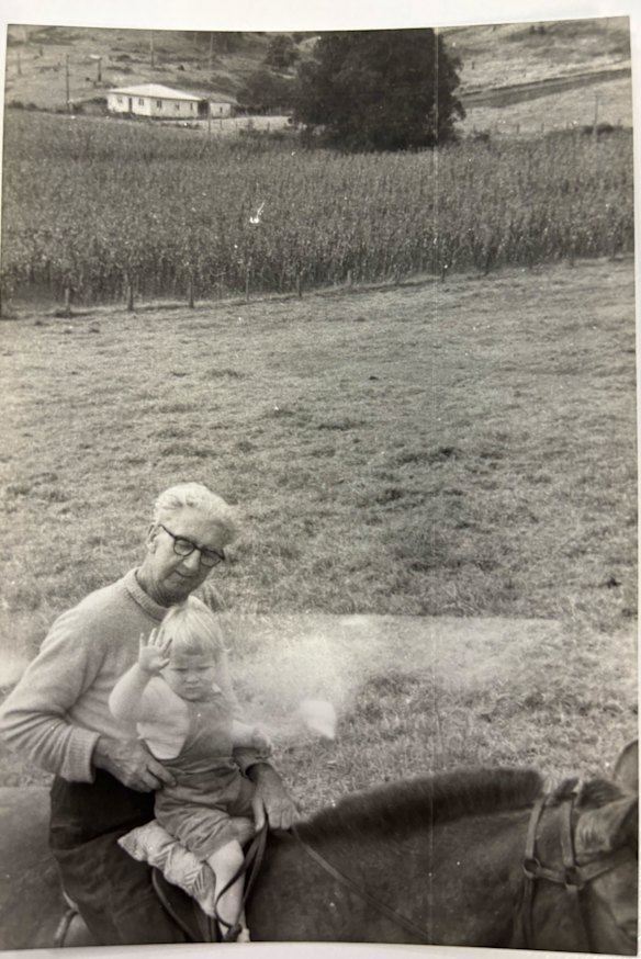 Reporter Julie Power with her grandfather on the family’s small dairy farm outside Nimbin in northern NSW.