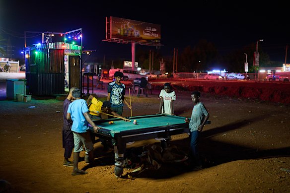 Children play pool in Omdurman, Sudan, on the outskirts of Khartoum. 