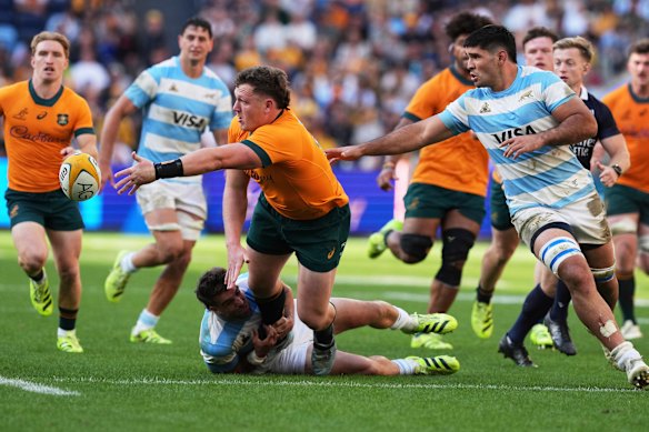 Angus Bell pushing an offload which was knocked on.