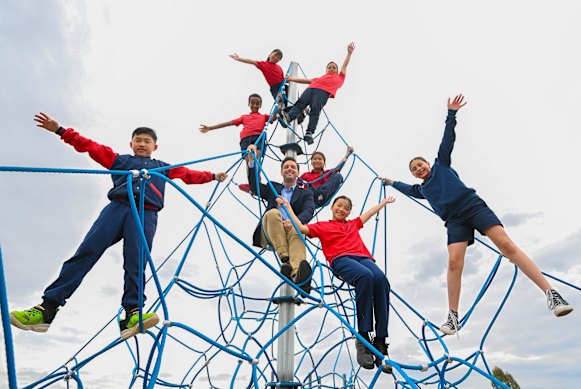  Albanvale Primary School principal Michael Uzunovski with year 3 and 5 students.