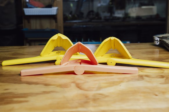 (Left) The original Dreamfarm ‘Fluicer’; (right) the Kmart version; (centre) the Temu dupe.