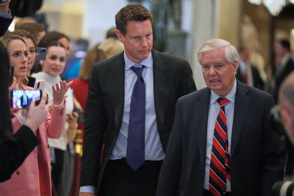 Paramount Skydance chairman and CEO David Ellison (left) arrives at the State of the Union with Republican Senator Lindsey Graham.