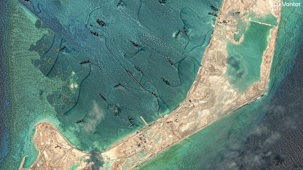Sand dredging vessels at Antelope Reef in the Paracel Islands in the South China Sea on March 25, 2026. 