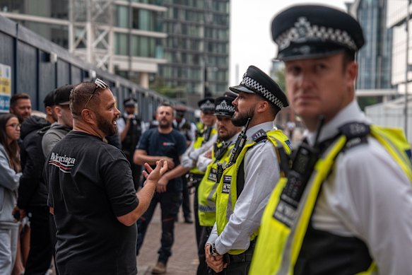 Police stand guard outside the Britannia Hotel.