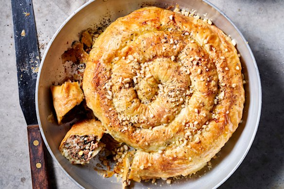 Serve this lamb, rice and vine leaf borek with garlic dip.