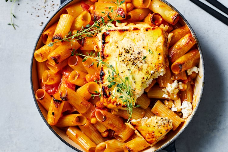 Tomato, harissa and chickpea pasta with charred hot honey feta.