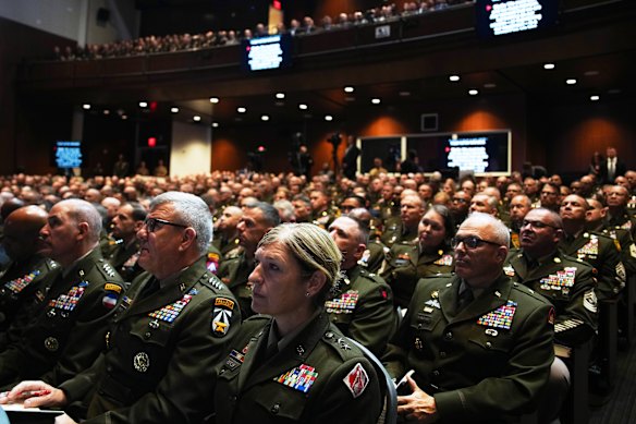 The US military’s top leaders sat mostly stone-faced through the politicised remarks from Trump and Hegseth.