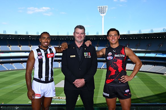 Jye Caldwell (right) defended the Bombers’ poor start to the season at the Anzac Appeal launch at the MCG on Monday, alongside Collingwood’s Isaac Quaynor and Anzac Appeal ambassador Marcus McEwen.