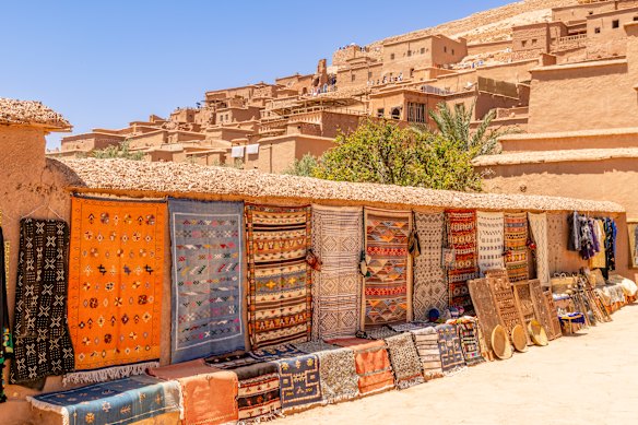 Berber carpets on display on the market streets in historic Ait Benhaddou.