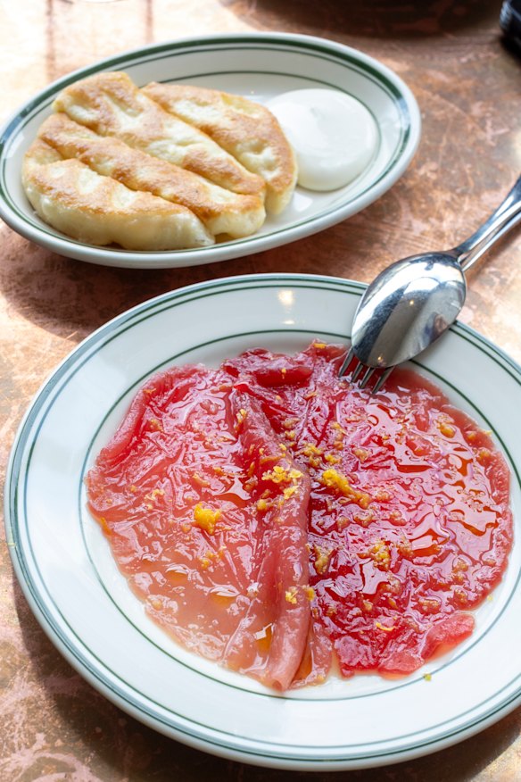 Marion’s famous pillow-soft flatbread and tuna crudo with yuzu.