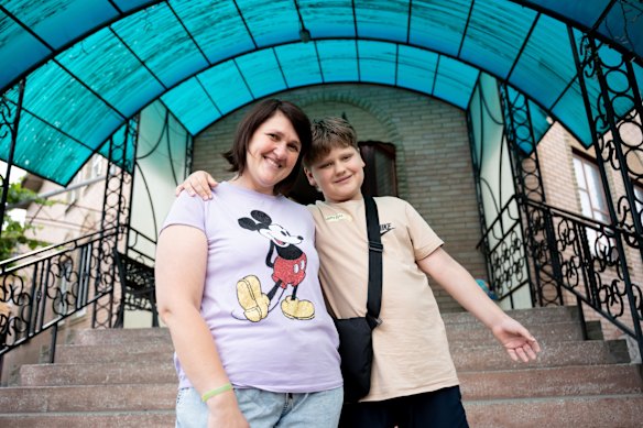 Svitlana Martynova brings her son Artem to school not just for lessons but for connection.