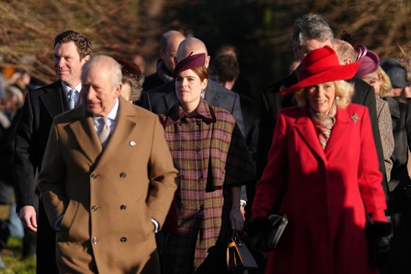 Princess Eugenie, centre rear, arrives with Britain’s King Charles III and Queen Camilla to attend the Christmas Day service at St Mary Magdalene Church.