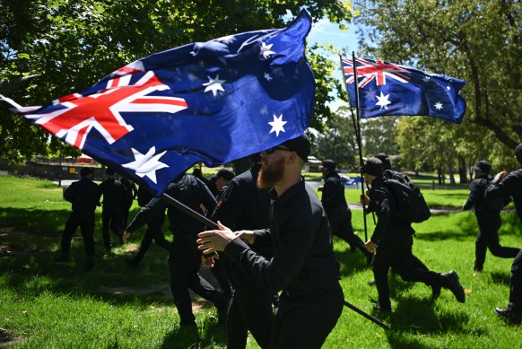 Members of the National Socialist Network are arrested as they hold a counter-protest on Australia Day in Adelaide.