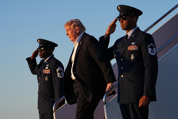 US President Donald Trump arrives on Air Force One at Joint Base Andrews, Maryland, on Sunday (US time).