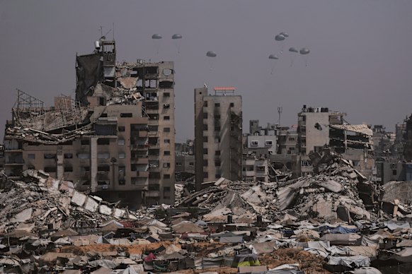 Humanitarian aid being air-dropped into Gaza City last week. 